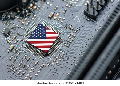 Flag of USA on a processor, CPU Central processing Unit or GPU microchip on a motherboard. US firms have become the latest collateral damage in US-China tech war. US blocks sales of AI chips to China.