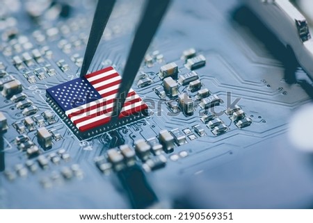Flag of USA on a processor, CPU Central processing Unit or GPU microchip on a motherboard. Congress passes the CHIPS Act of 2022 to strengthen domestic semiconductor manufacturing, research and design Stock photo © 