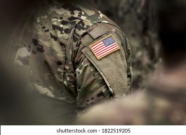 Flag Of USA On Soldiers Arm. Veterans Day. The United States Armed Forces. Military Forces Of The United States Of America. Remembrance Day. Memorial Day.