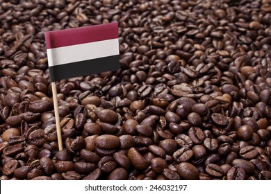 Flag Of Yemen Sticking In Roasted Coffee Beans.(series)