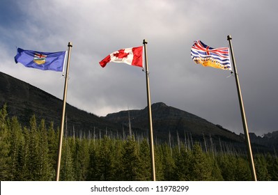 Flags of Alberta, Canada and British Columbia in the wind