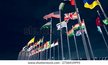 Flags of all nations fluttering in the wind