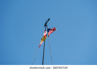 Flags Atop The Maryland State Capitol Building