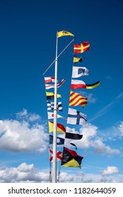 Flags in Blue Sky