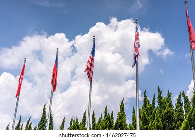 lot of flags with blue sky