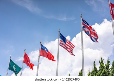 lot of flags with blue sky