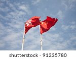 flags of China and Hong kong with blue sky