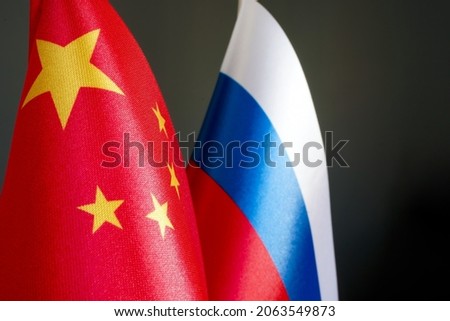 Flags of China and Russia. Relationships between countries.