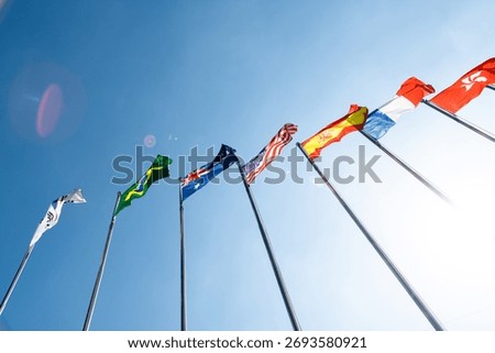 Flags of different countries in the sky