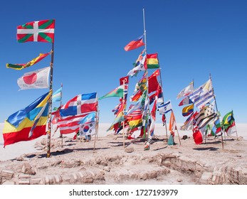 Flags of different countries of the world in the world's largest salt flat, Uyuni Salt Flat, Salar de Uyuni, Bolivia. Copy space for text
