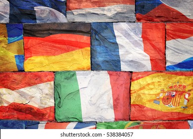 The Flags Of EU Countries Drawn On A Brick Wall