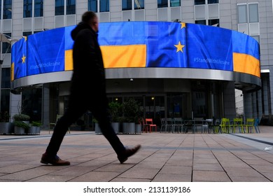 Flags Of European Union And Ukraine Outside Of EU Parliament Building, In Brussels, Belgium On March 1, 2022.