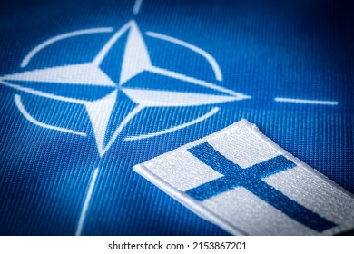Flags of Finland and NATO, The largest defense alliance in the world, The concept of expanding the North Atlantic alliance with new Scandinavian countries May 2022