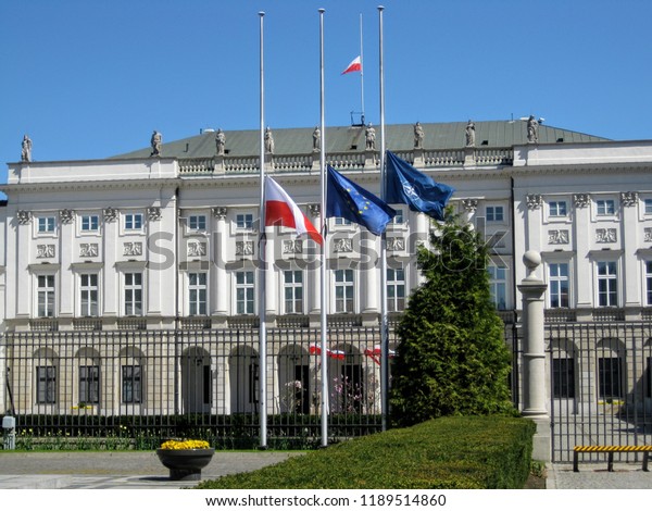 Flags flying at half-mast in front of the Presidential\
Palace in Warsaw. Poland in mourning after the Tu-154 aircraft of\
the Polish Air Force crashed near the  Smolensk, Russia on 10 April\
2010. 