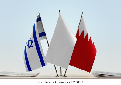 Flags Of Israel And Bahrain With A White Flag In The Middle