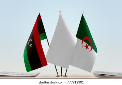 Flags Of Libya And Algeria With A White Flag In The Middle