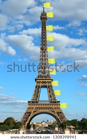 flags like made with jackets symbol of Yellow vests movement on Eiffel Tower in Paris France
