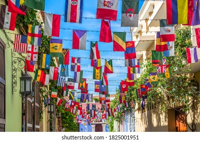 Flags of many countries in the streets of Getsemani neighborhood at the morning