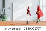 FLAGS OF NEPAL AND VIETNAM ON TABLE