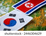 Flags of North and South Korea facing each other, Concept of historical past of neighboring countries