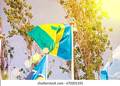 Flags  on the background of the blue sky in the sunlight