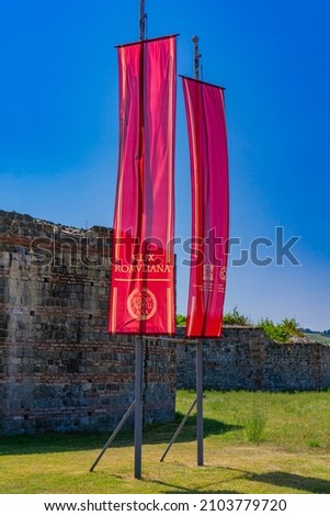 Flags on entrance of Felix Romuliana, remains of palace of Roman Emperor Galerius near Zajecar, Serbia. It is UNESCO World Heritage Site since 2007.