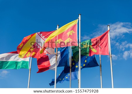 Flags on Place Rapp square, Colmar. Colmar is the third-largest commune of the Alsace region in north-eastern France, renowned for its well preserved old town. Colmar, France. Stock photo © 