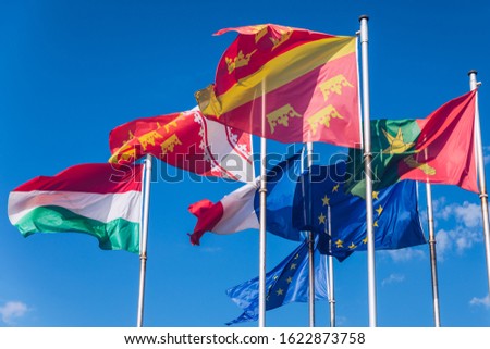 Flags on Place Rapp square, Colmar. Colmar is the third-largest commune of the Alsace region in north-eastern France, renowned for its well preserved old town. Colmar, France. Stock photo © 