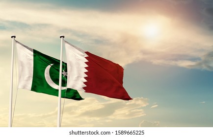 Flags of Pakistan and qatar friendship flag waving on the sky with beautiful sun light - image - Shutterstock ID 1589665225