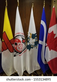 Flags Representing Indigenous Peoples Of Canada. In Order From The Left Is The Nunavut, Assembly Of Firsts Nations, Inuit, Metis And The Flag Of Canada 