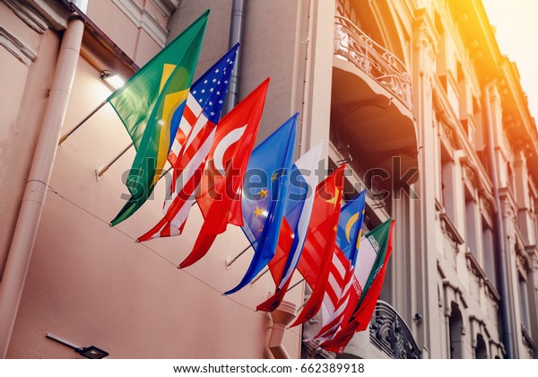Flags of russia, united states,\
brazil, turkey, china, european union, iran on embassy\
house