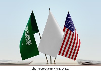 Flags Of Saudi Arabia And USA With A White Flag In The Middle