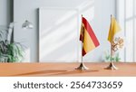 FLAGS OF SPAIN AND VATICAN ON TABLE