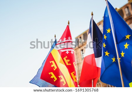 Flags of Strasbourg, Alsace, France and the European Union on a city square near the town hall - symbolism Stock photo © 