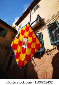 Flags Of Teams On Houses During The Il Palio Holiday In Siena