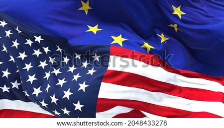 The flags of the United States and the European Union on top of each other. International relations and diplomacy.