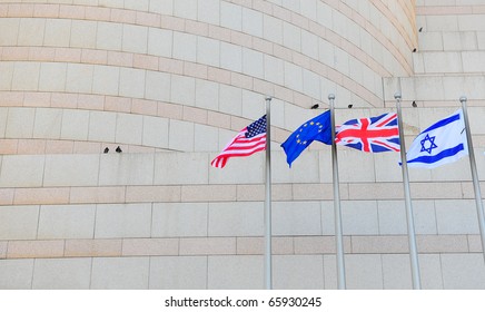 Flags US, UK, EU And Israel In Front Of The Granite Facade