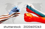 Flags of usa or United States of America , Russia and China on hands punch to each others on light gray world map background, USA vs China and Russia in world war crisis concept