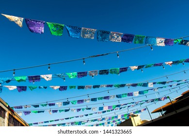 Flags Waving Over The Entrance To Southern California State Fair