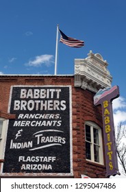 Flagstaff, Arizona - March 25, 2017: Detail Of The Advertising On The Side Of The Historic Babbitt Brothers Building In Flagstaff. Built In 1888, It Now Houses Babbitt's Backcountry Outfitters.