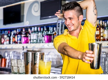 Flair Bartender In Action, Working Behind The Cocktail Bar