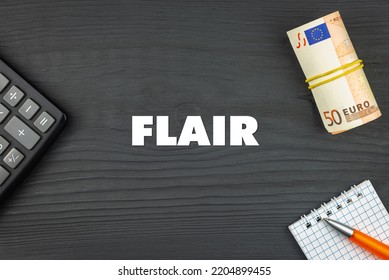 FLAIR - Word (text) And Euro Money On A Wooden Background, Calculator, Pen And Notepad. Business Concept (copy Space).