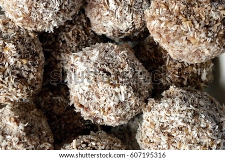 Homemade cookies - millet flake balls in grated coconut