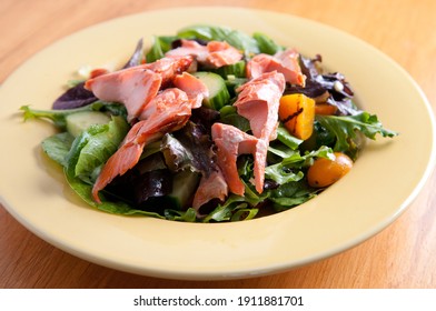 Flaked Grilled Sockeye Salmon On A Fresh Beet Salad