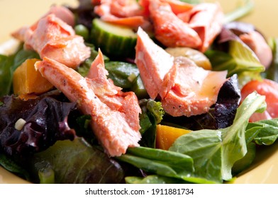 Flaked Grilled Sockeye Salmon On A Fresh Beet Salad