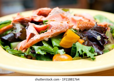 Flaked Grilled Sockeye Salmon On A Fresh Beet Salad