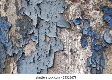 Flaking paint from an old wall.