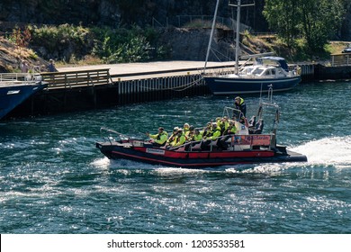 Flam, Norway - July 2018: Tourists On A Aurlandsfjord Fjord Safari Tour In The Flam Harbor On A RIB Boat