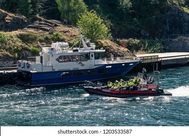 Flam, Norway - July 2018: Tourists On A Aurlandsfjord Fjord Safari Tour In The Flam Harbor On A RIB Boat