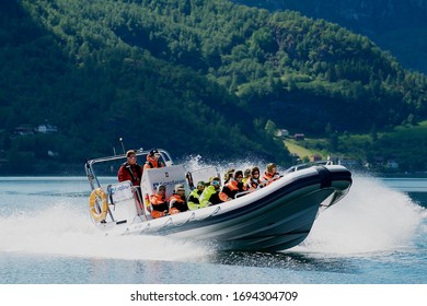 Flam, Norway - June 08,2012: Tourists Enjoy The Safari Tour By Speed Boat At The Aurlandsfjord In Flam, Norway.